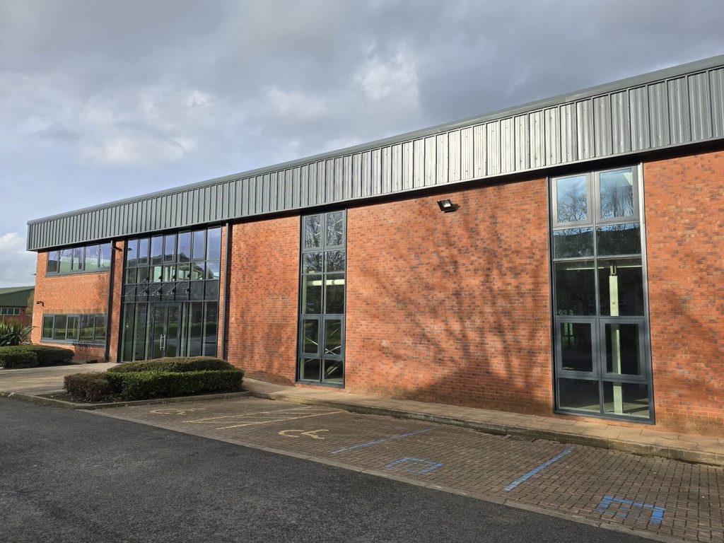 Aluminium curtain walling glazed floor to floor on a commercial elevation