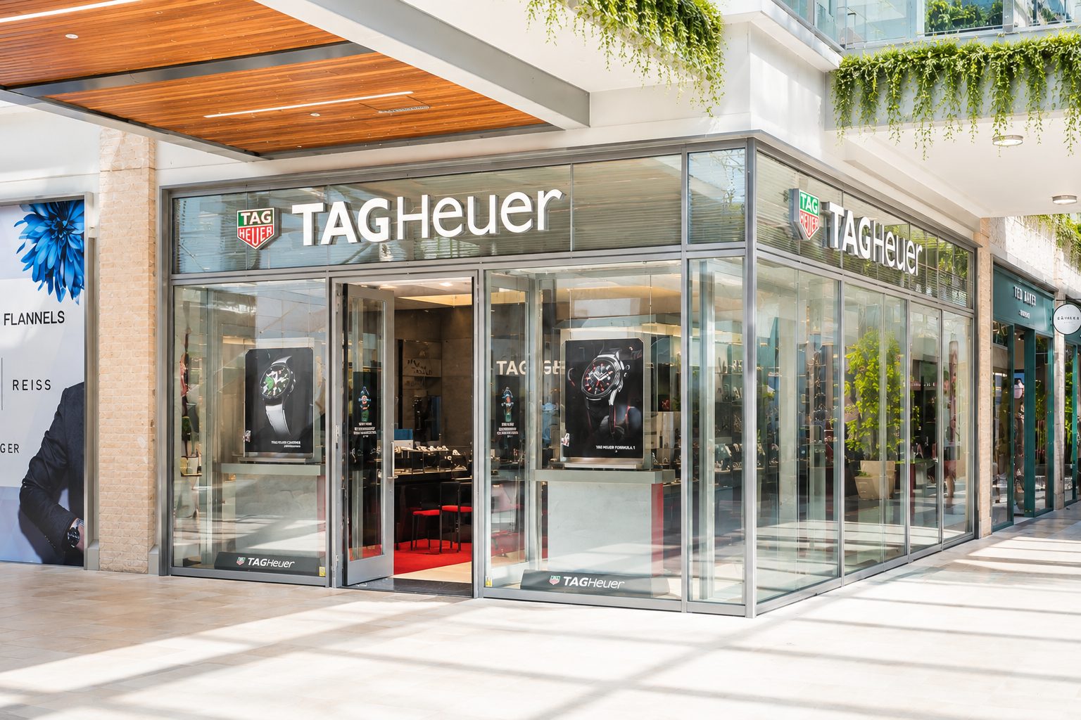 Glazed aluminium shopfront to a TAG Heuer boutique in a shopping centre