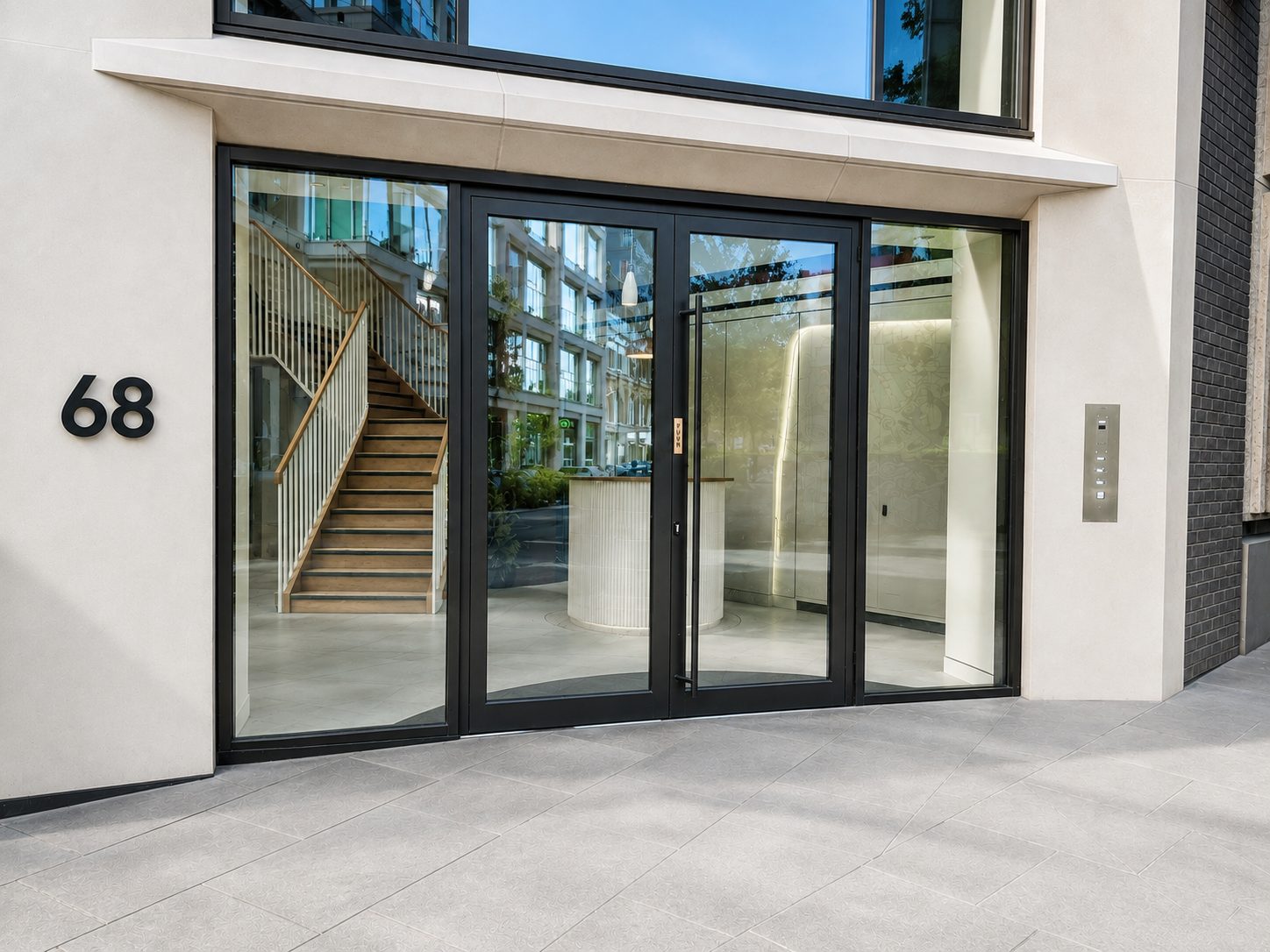 Glazed aluminium commercial entrance door to an office lobby