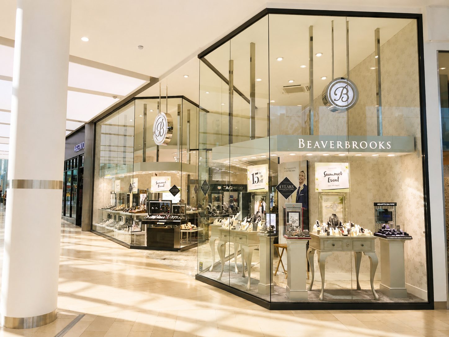 Large format structural glass corner shopfront to a jewellers