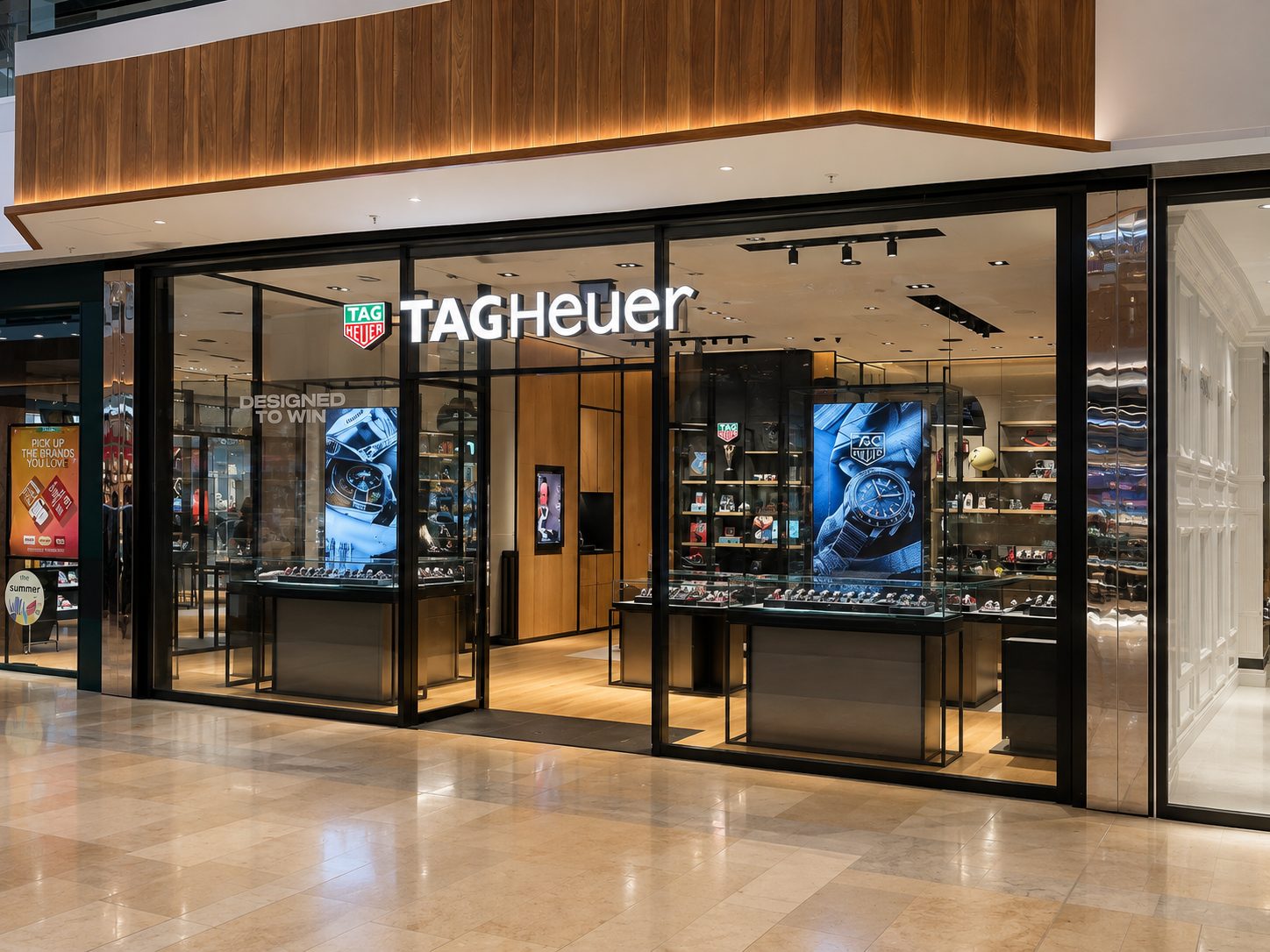 Large format frameless glass shopfront to a watch boutique