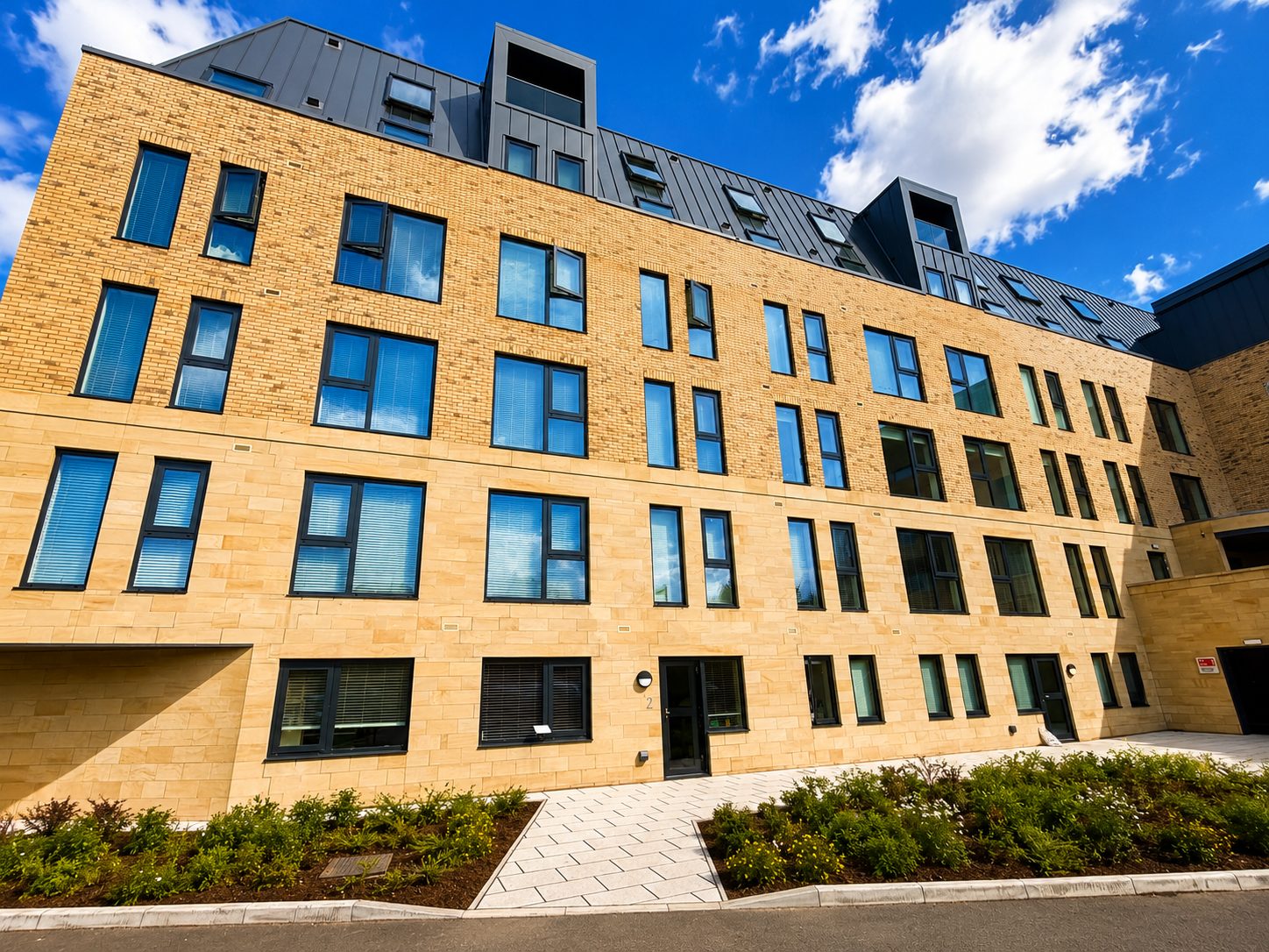 Aluminium windows on a modern brick apartment block